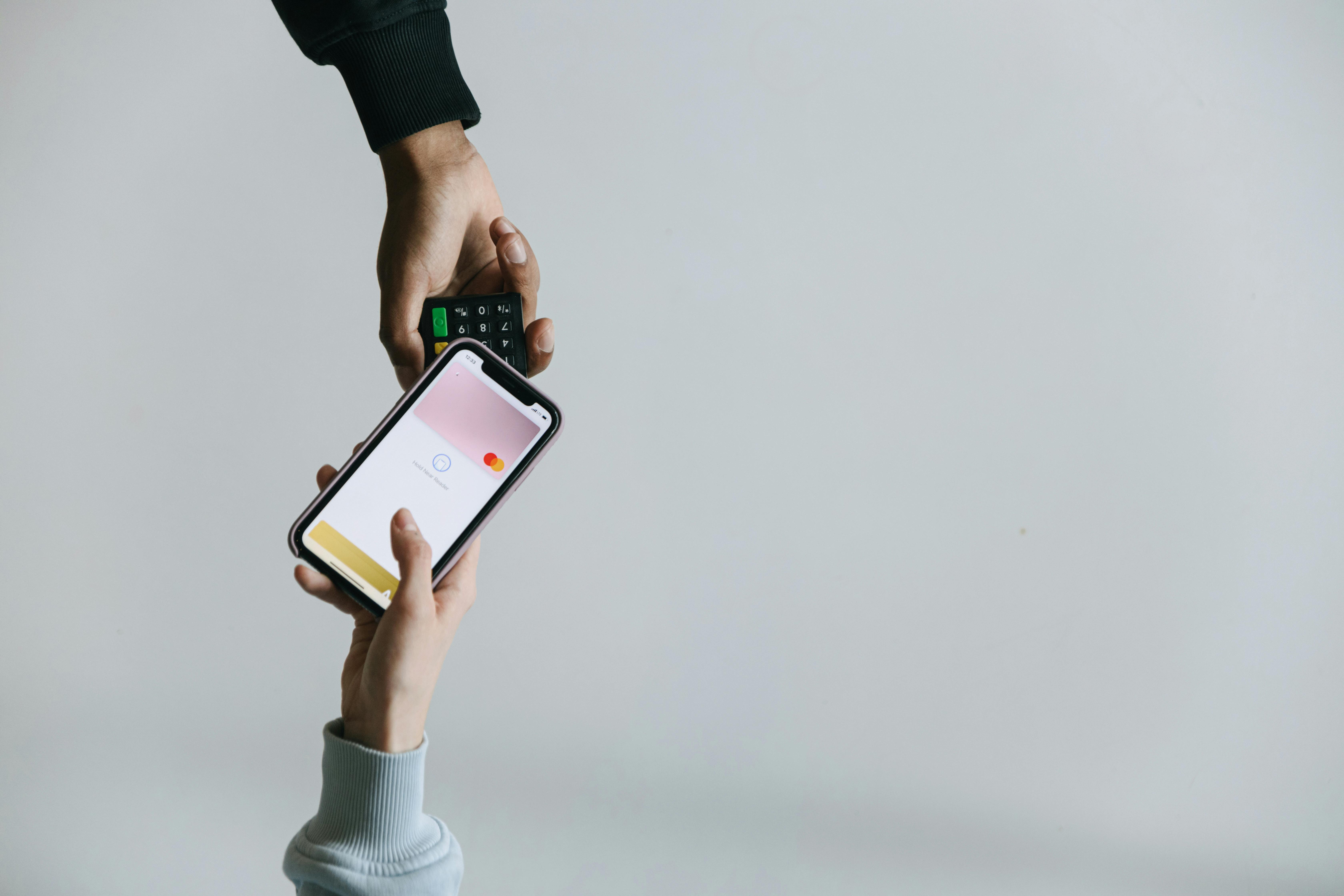 Smartphone payment confirmation in a clean modern setting
